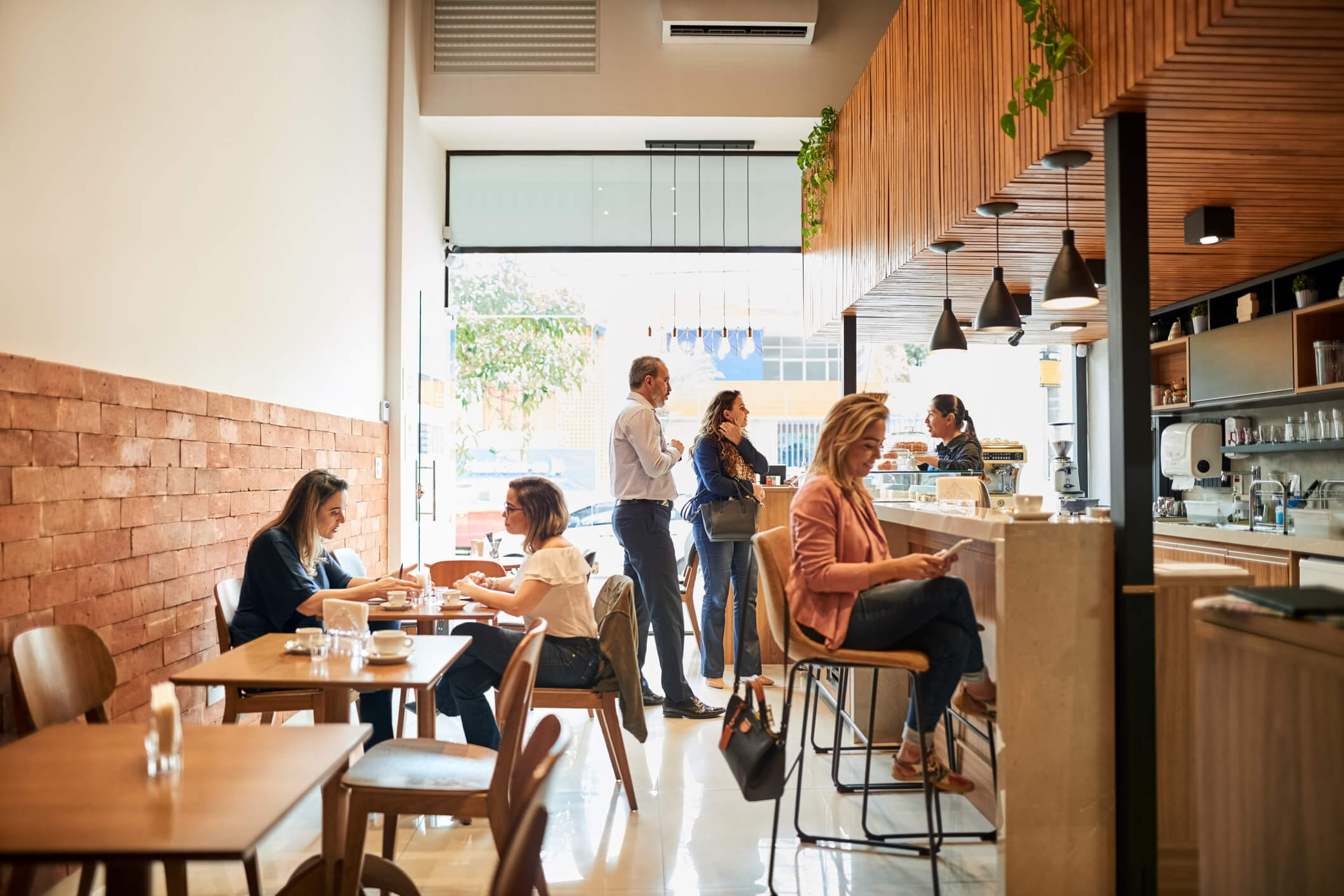 people socializing at a cafe