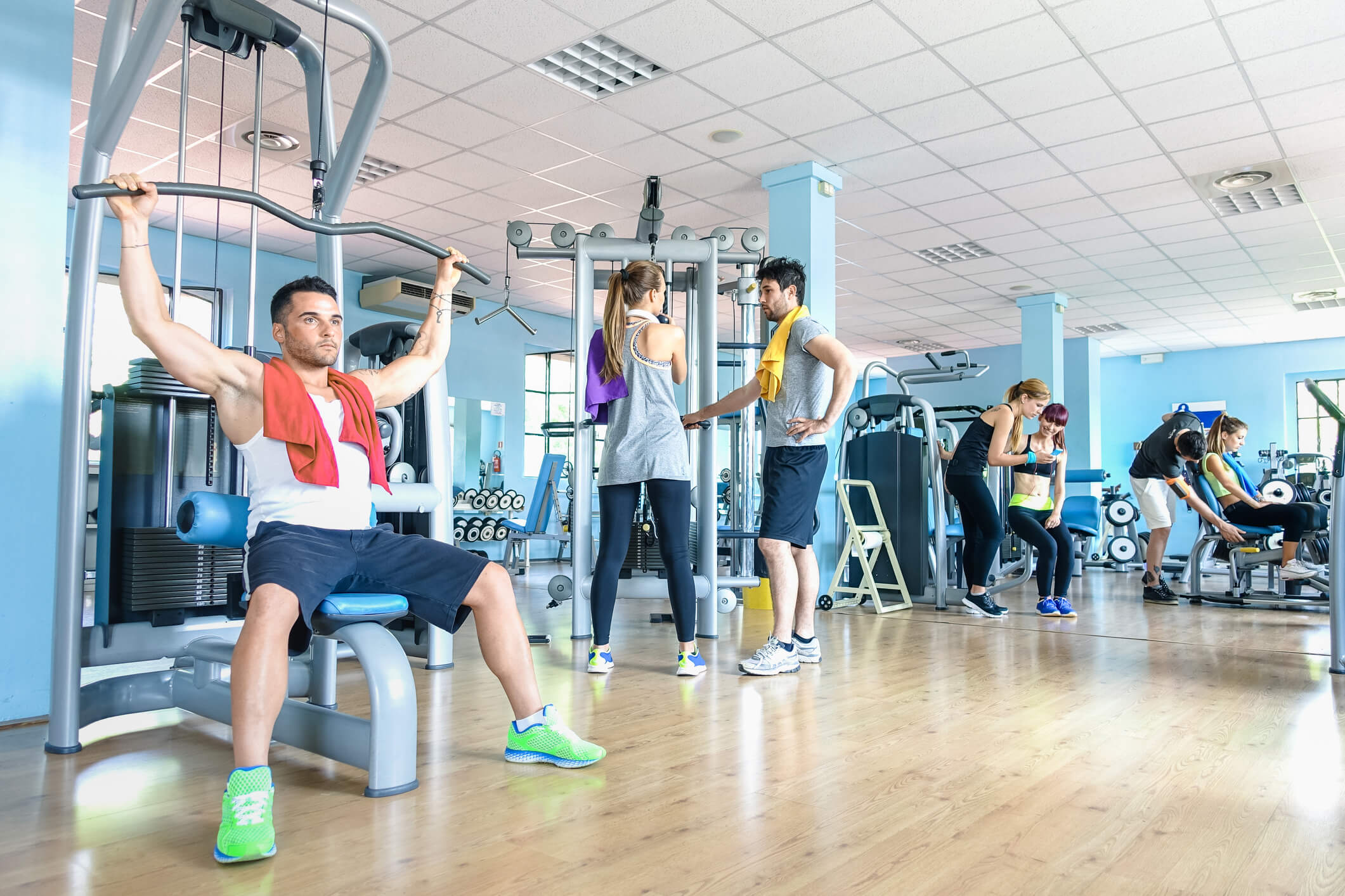 people working out inside of a gym