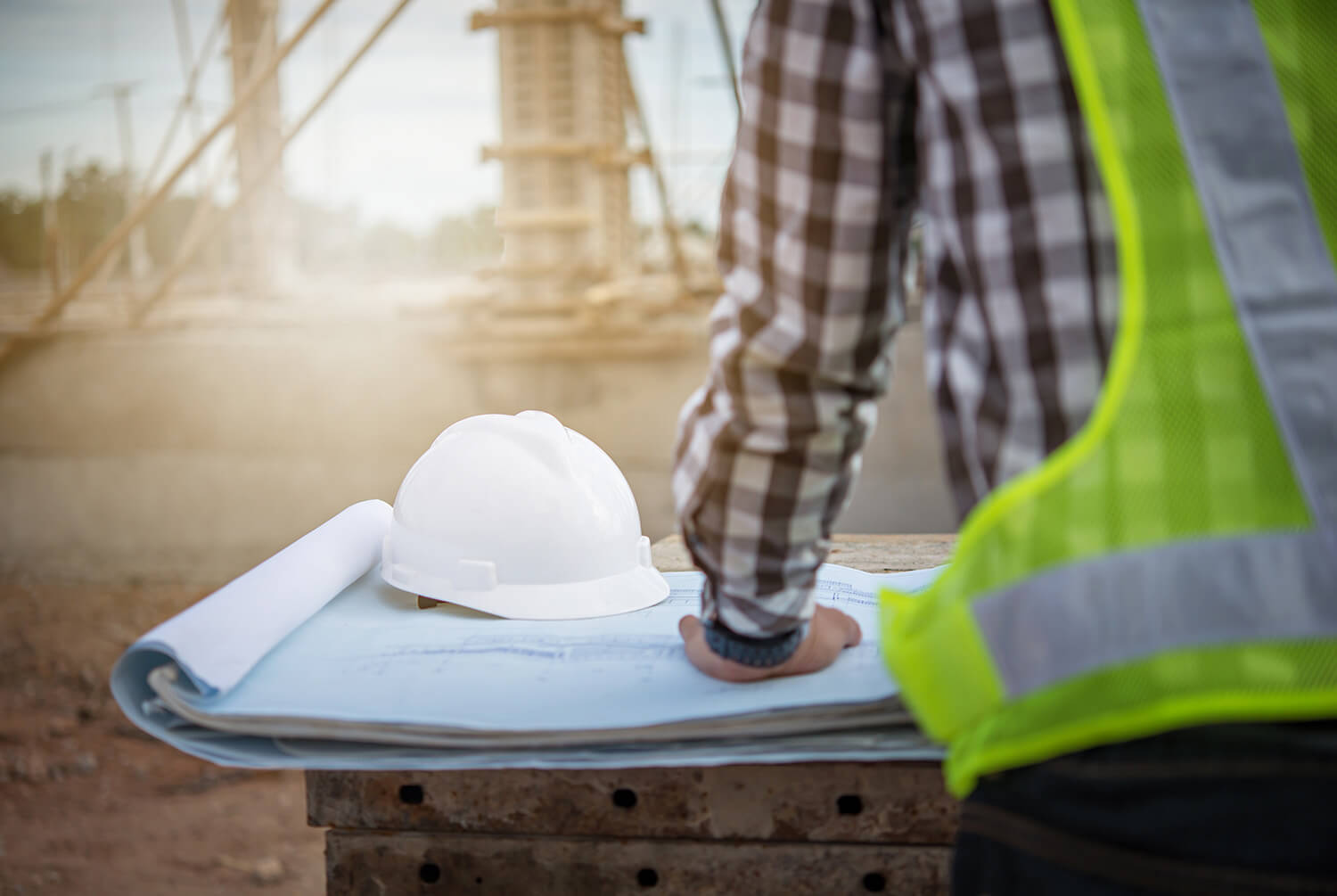 Construction Worker Reviews Site Plans