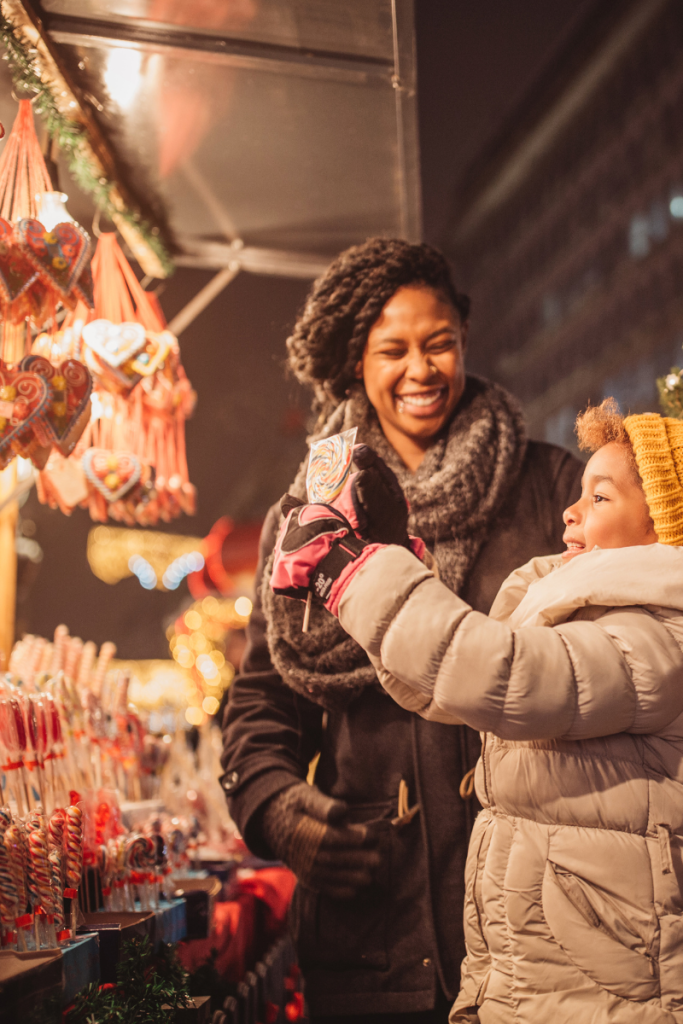 Mother and daughter shopping during the holiday season.